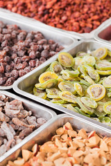 Variety of dried fruit on a market in China.