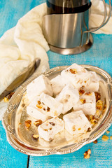 Traditional oriental sweets - nougat with walnuts, selective foc