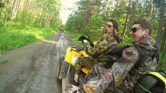 Two Man on ATV in forest video Selfe