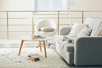 Sofa and armchair in living room