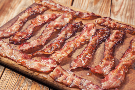 bacon on a wooden plate