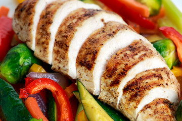Grilled chicken fillet, breast with cooked vegetable