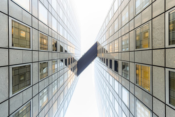 Sky bridge linking two buildings together in the mist