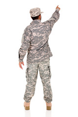 military serviceman pointing empty space