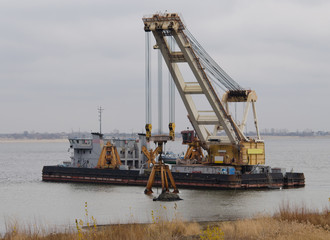 Dredger ship on the river