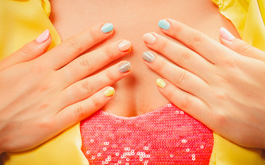 Fototapeta premium Woman hands with color nail polish. Manicure.
