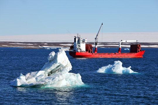 Iceberg and cargo ship
