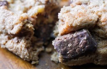 Extreme Macro Of The Broken Edge Of A Cookie With A Big Bittersweet Chocolate Chip