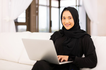 muslim woman using laptop