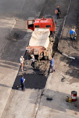 Repair team restores the pavement
