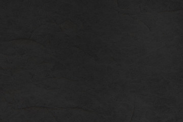 black slate stone tile background - granite texture closeup