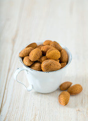 almonds on wooden surface