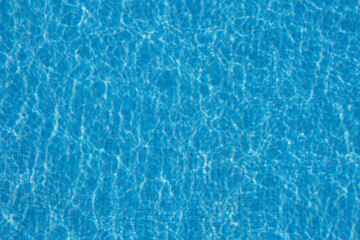 pool water background - light reflection in swimming pool