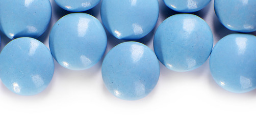 Blue drugs on white background, copy space