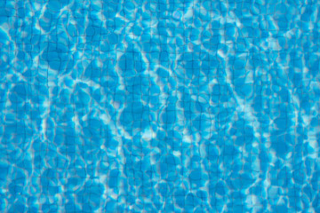pool water background - light reflection in swimming pool