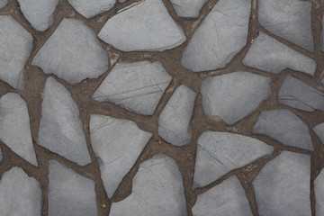 natural stone wall texture background / stone paved floor