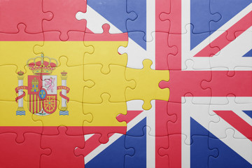 puzzle with the national flag of great britain and spain