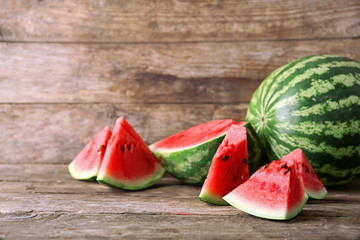 Fresh sliced watermelon wooden background
