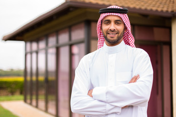 young arabian man with arms crossed - 97156022