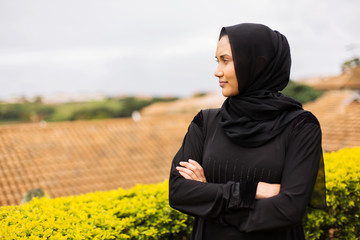 thoughtful young muslim woman