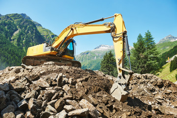 Obraz premium excavator loader machine at construction site