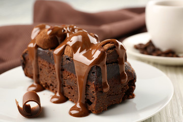 A piece of chocolate cake on the table, close-up