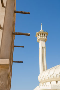 old town dubai white mosque against a beautiful blue sky