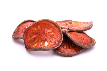 Dry Bael Fruit tea (Aegle marmelos) on white background