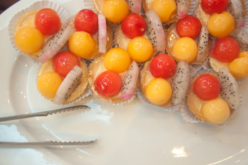 fruit tartlets (watermelon, cantaloupe,orange and dragon fruit