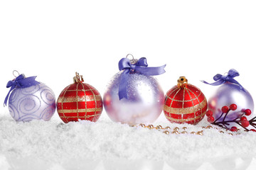 Christmas balls on snow with white background