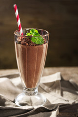 Chocolate cocktail on wooden background