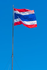 Thai flag of Thailand with blue sky background