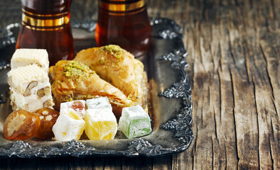 Turkish sweets. (Baklawa, mixed Lokum, Grape Molasses with walnu