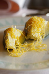 Delicious and exotic pumpkin custard dessert of Thailand.