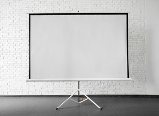 Blank projector canvas in the office