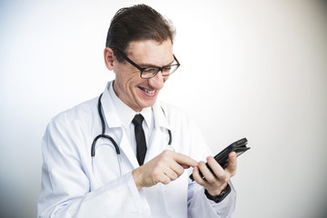 fun doctor holding smartphone