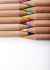 Fototapeta premium Color pencils on white background closeup 