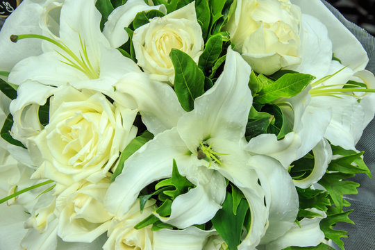 Fototapeta White rose and white lilies flower bouquet.
