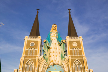 Virgin Mary Statue blue sky background in Thailand church
