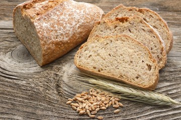 Baked bread on wooden table