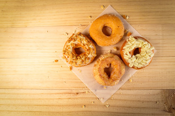 Donuts on wooden background