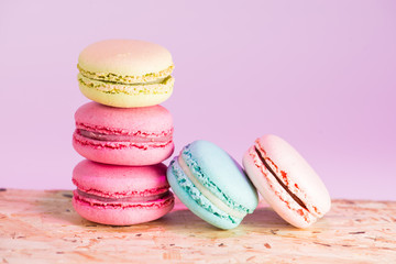 series Colorful and tasty French cookies Macarons on a colorful