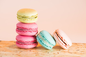 series Colorful and tasty French cookies Macarons on a colorful