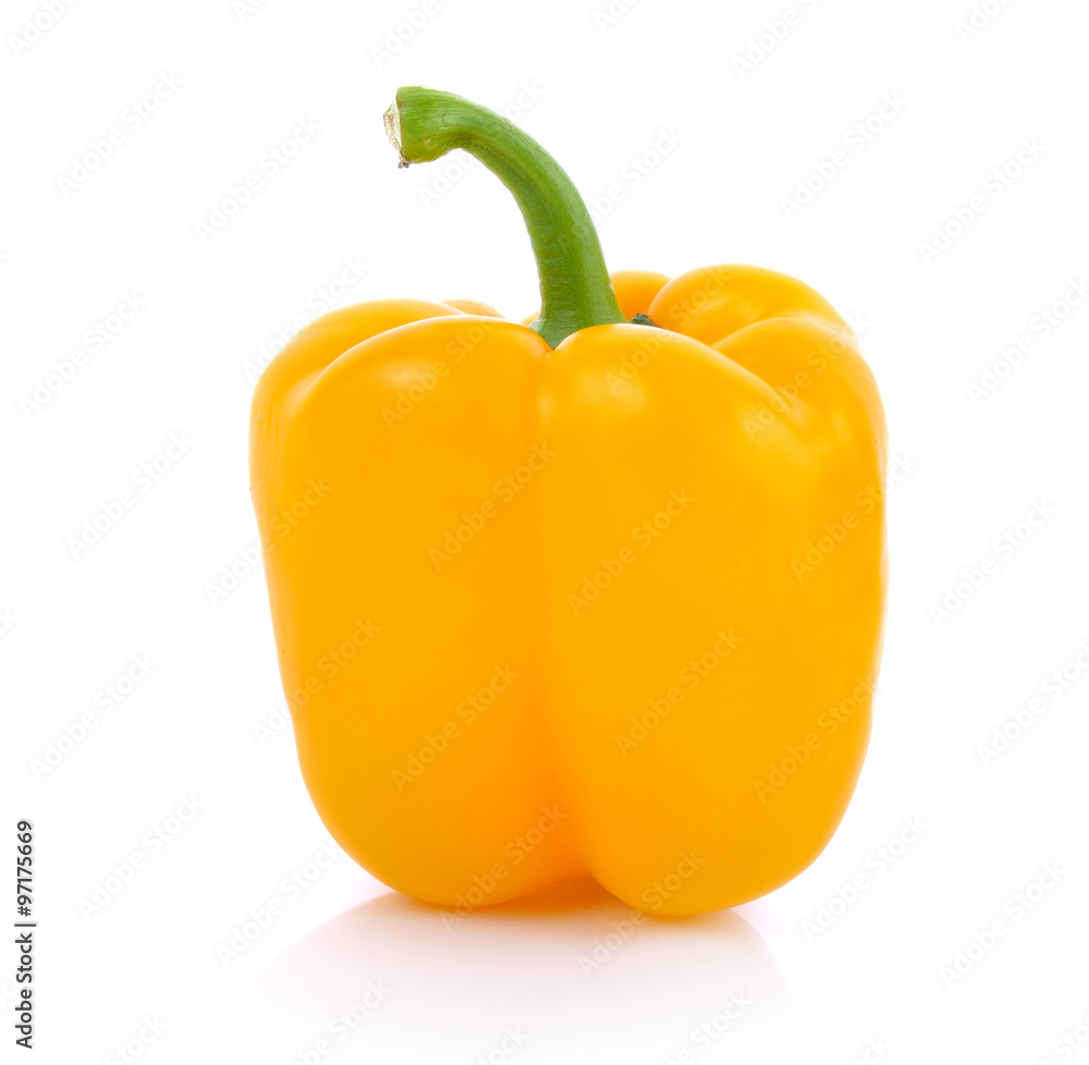 Wall mural yellow pepper on white background