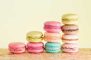Fototapeta na wymiar series Colorful and tasty French cookies Macarons on a colorful