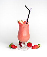 strawberries smoothie with two straws
