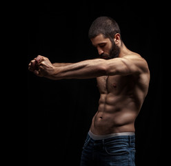 Fototapeta premium strong athletic berdy man 