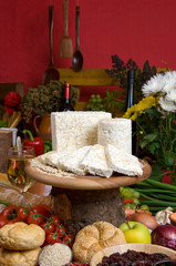 cheese on knife board in rustic surrounding