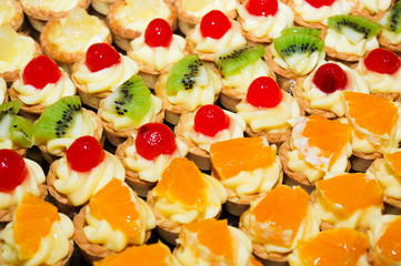 mini fruit tarts with various fruit