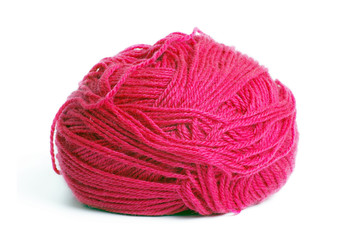 Red woolen threads on white background